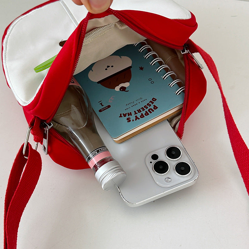 A multi-purpose red apple KT cat shoulder bag eprolo